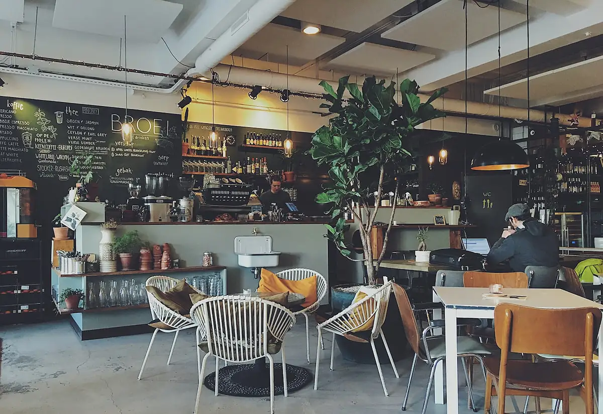 Cozy coffee shop interior with warm lighting